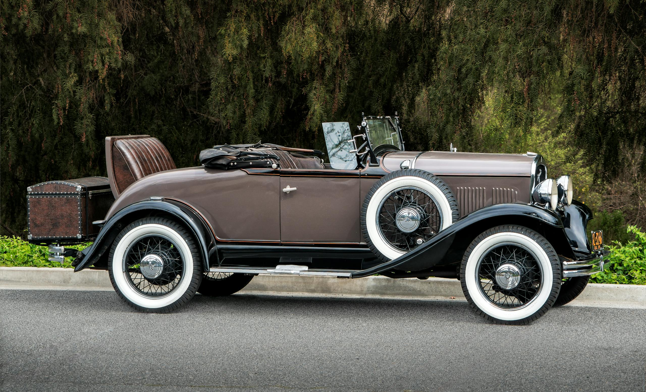 Classic brown convertible parked outdoors with vintage charm in Laguna Niguel, CA.